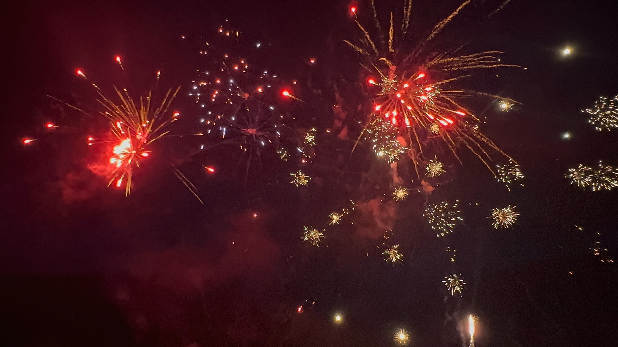 Fireworks bursting across the night sky
